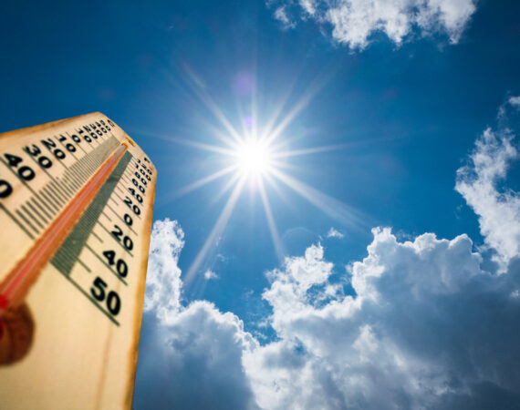 Thermometer Sun high Degres. Hot summer day. High Summer temperatures